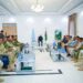 Aden Madobe seated before South West State military commanders at a security meeting in Baidoa