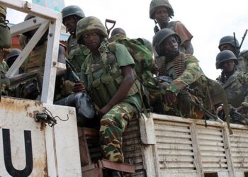 AUSSOM troops riding in an African Union transport in Somalia, the force whose fuel, rations and medical support run through the UNSOS system now being wound down