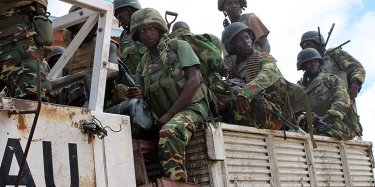 AUSSOM troops riding in an African Union transport in Somalia, the force whose fuel, rations and medical support run through the UNSOS system now being wound down