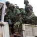 AUSSOM troops riding in an African Union transport in Somalia, the force whose fuel, rations and medical support run through the UNSOS system now being wound down