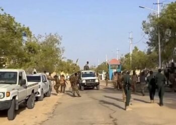 Puntland forces and technicals at the gate of the former PSF compound in Bosaso after the handover