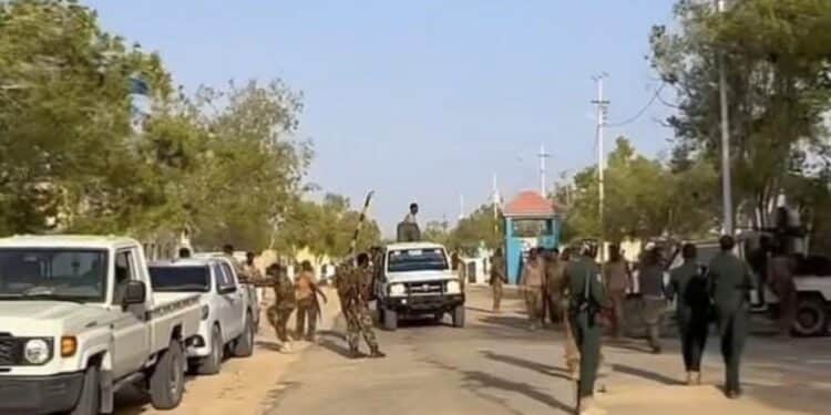 Puntland forces and technicals at the gate of the former PSF compound in Bosaso after the handover