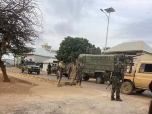 Somali National Army troops and armoured vehicles on a Baidoa street, the city at the centre of the new federal offensive in the Bay region
