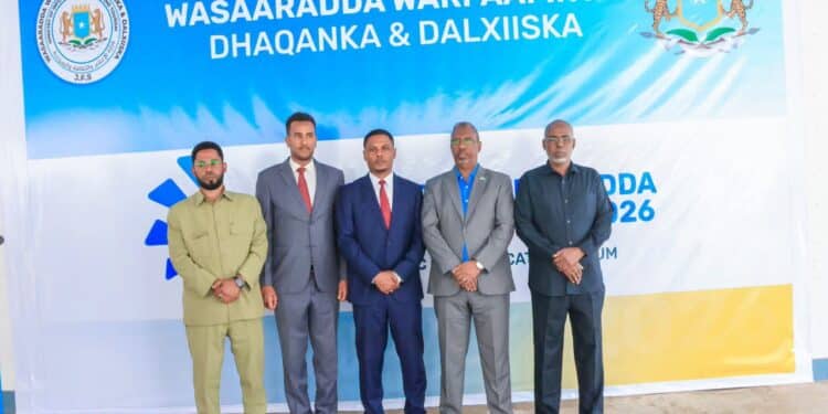 Officials before the Ministry of Information banner at the strategic communication forum in Mogadishu