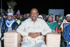 President Said Abdullahi Deni seated before the crowd in Xaafuun on 9 September 2026, where he said Puntland will fight the pirates the way it fought Daesh