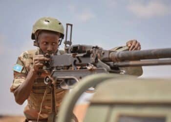 A Somali National Army gunner on a technical, the kind of unit fighting al-Shabaab at Basra thirty kilometres from Mogadishu
