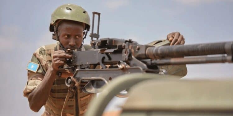 A Somali National Army gunner on a technical, the kind of unit fighting al-Shabaab at Basra thirty kilometres from Mogadishu