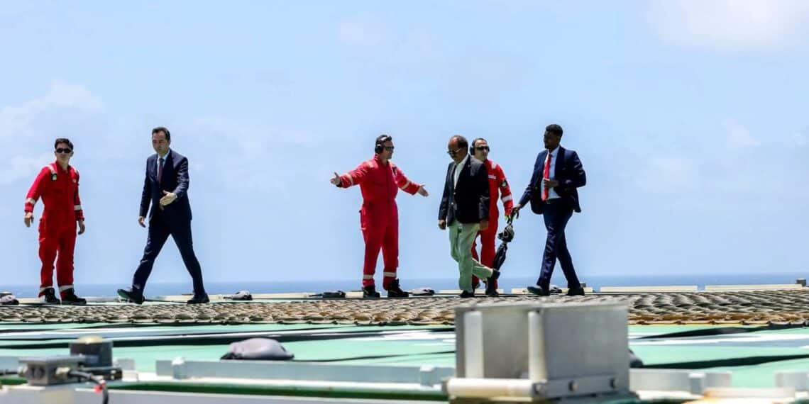 President Hassan Sheikh Mohamud crosses the helideck of the Turkish drillship Cagri Bey at the CURAD-1 well off Mogadishu, October 2026