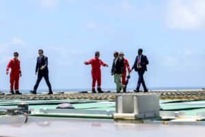 President Hassan Sheikh Mohamud crosses the helideck of the Turkish drillship Cagri Bey at the CURAD-1 well off Mogadishu, October 2026