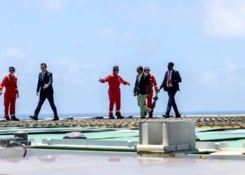 President Hassan Sheikh Mohamud crosses the helideck of the Turkish drillship Cagri Bey at the CURAD-1 well off Mogadishu, October 2026