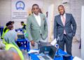 Officials visit a Banadir voter registration centre in Mogadishu run by Abdikarim Ahmed Hassan's electoral commission, with staff in high-visibility vests at the desks