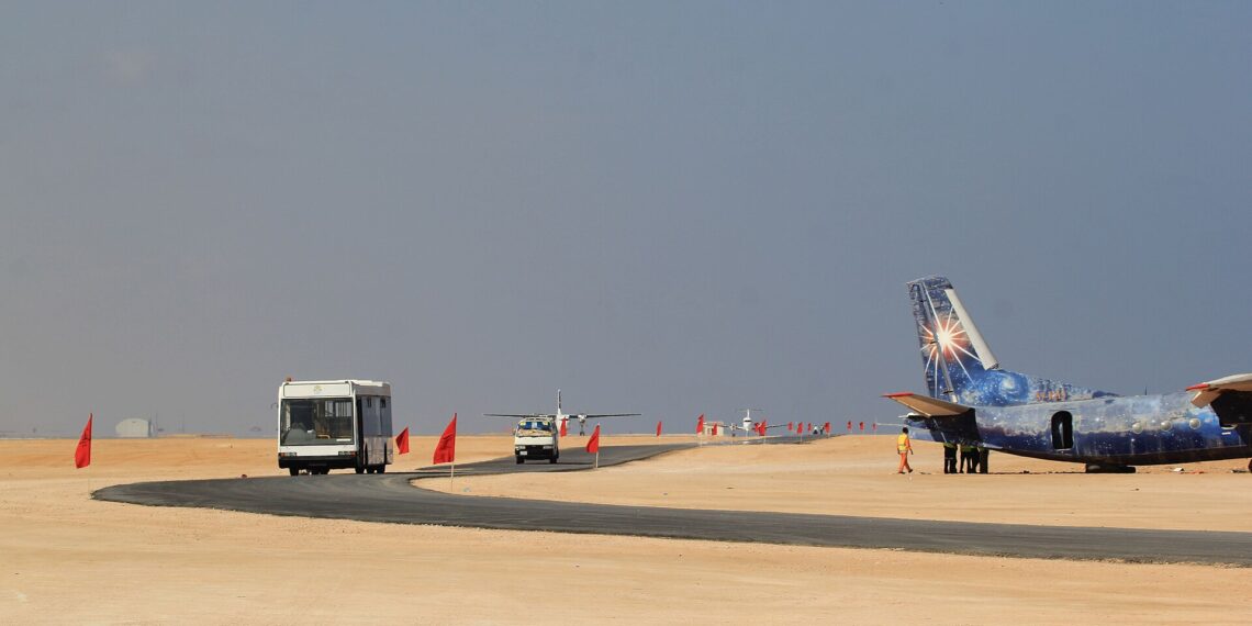 A passenger shuttle and aircraft on the apron at Bosaso airport, the Puntland airfield from which Emirati drones flew to strike al-Shabaab in Galgala