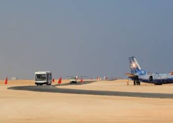 A passenger shuttle and aircraft on the apron at Bosaso airport, the Puntland airfield from which Emirati drones flew to strike al-Shabaab in Galgala