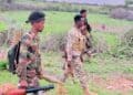 Somali National Army soldiers with rifles and an RPG launcher in southern Somalia, in a photograph published with reports of the Jameeco fighting