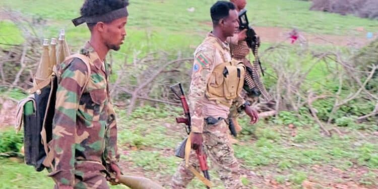 Somali National Army soldiers with rifles and an RPG launcher in southern Somalia, in a photograph published with reports of the Jameeco fighting